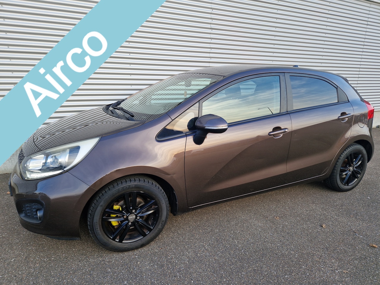 Kia Rio - 1.2 CVVT Super Pack Climatronic keyless PDC NAP - AutoWereld.nl