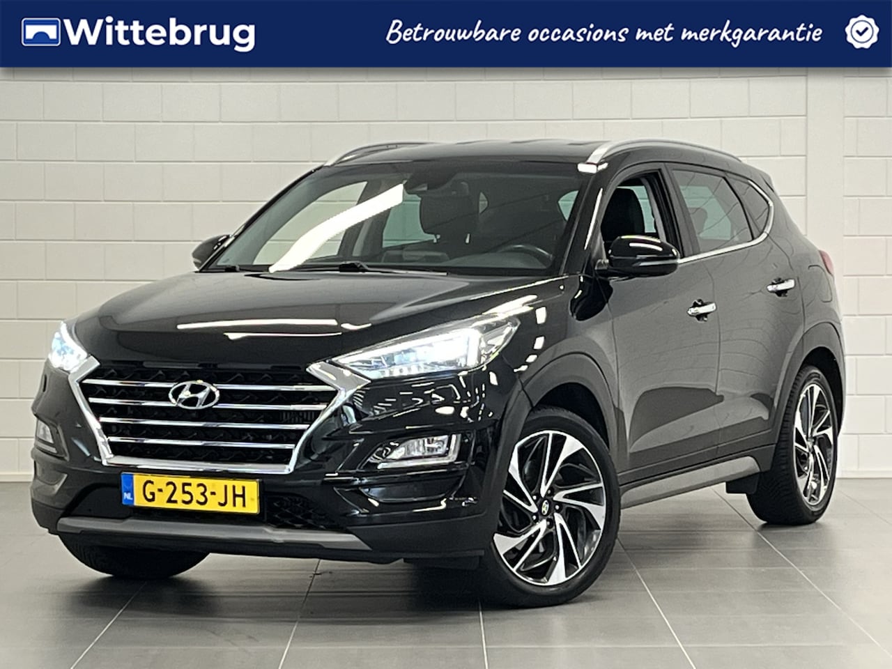 Hyundai Tucson - 1.6 T-GDI Premium 177 PK AUTOMAAT! | TREKHAAK | LEDER | COMPLETE UITVOERING! - AutoWereld.nl