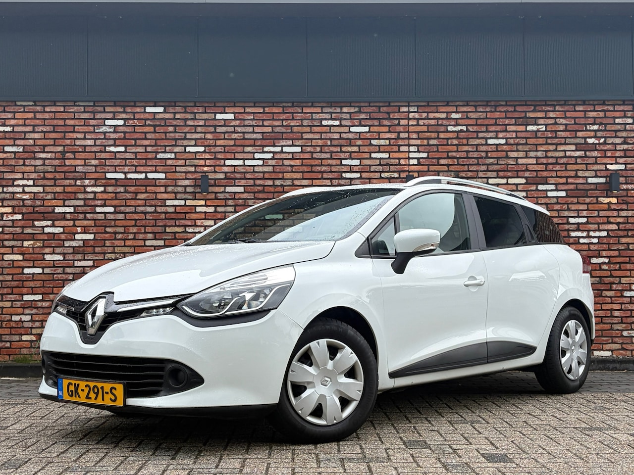 Renault Clio Estate - 0.9 TCe Expression Nav/Cruise Pdc 1e Eigenaar Airco Orig.NL Voll.Onderhouden! - AutoWereld.nl