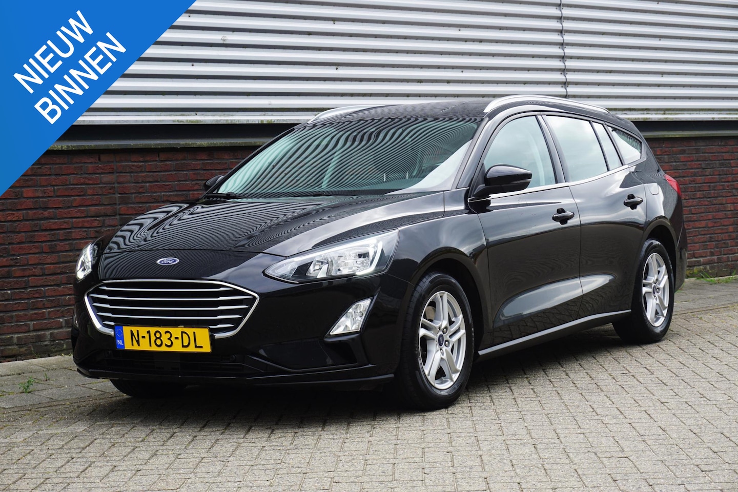 Ford Focus Wagon - 1.0 EcoB.125PK Hybrid Business/Camera/1e Eigenaar/ Metallic Black. - AutoWereld.nl