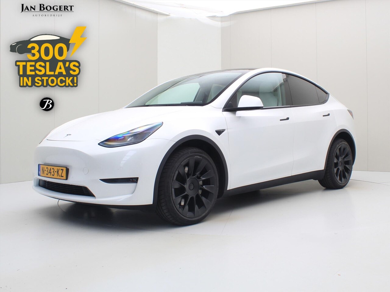Tesla Model Y - Long Range AWD 75kWh 351pk 92,2% SoH [ WIT LEDER+TREKHAAK+AUTOPILOT+20 INCH+PREMIUM AUDIO - AutoWereld.nl