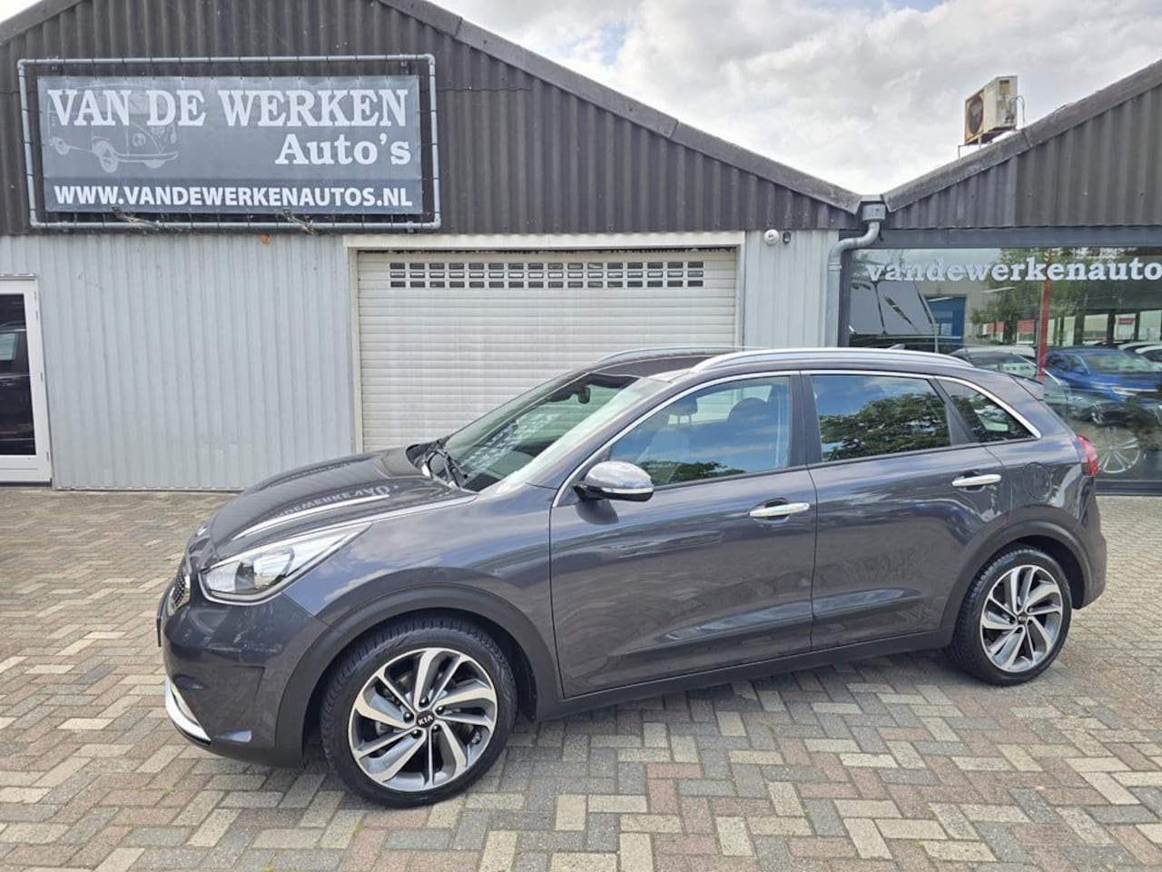 Kia Niro - 1.6 GDi Hybrid DynamicLine AUTOMAAT Clima|Navi|Cruise|Leer|Afn.Trhaak|Nap!! - AutoWereld.nl