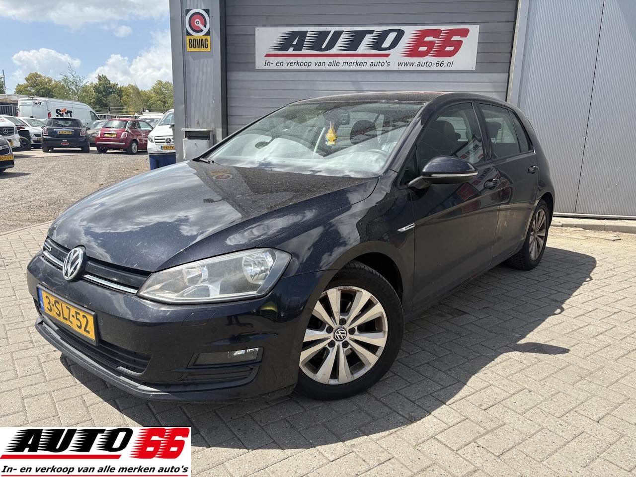 Volkswagen Golf - 1.6 TDI Comfortline BlueMotion AUTOMAAT - AutoWereld.nl