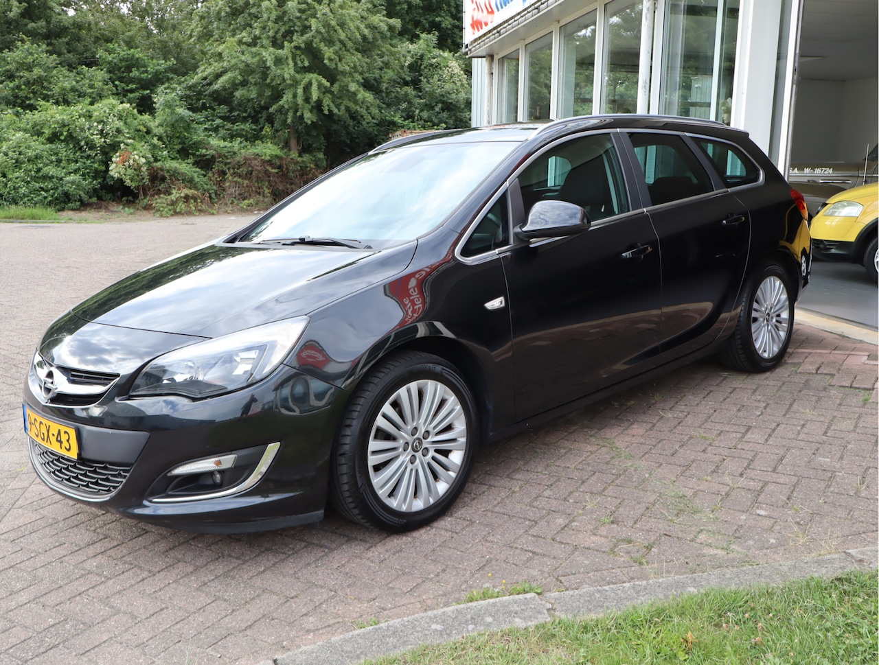Opel Astra Sports Tourer - 1.4 Turbo Design Edition Keurige Auto! - AutoWereld.nl