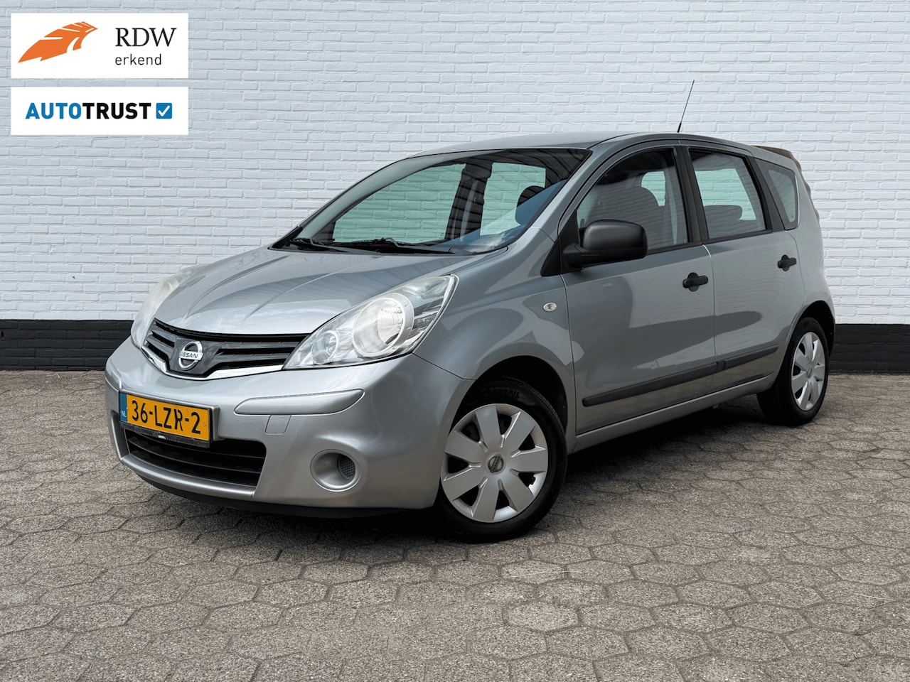Nissan Note - 1.4 Visia AIRCO l TREKHAAK l APK NIEUW l NETTE STAAT! - AutoWereld.nl