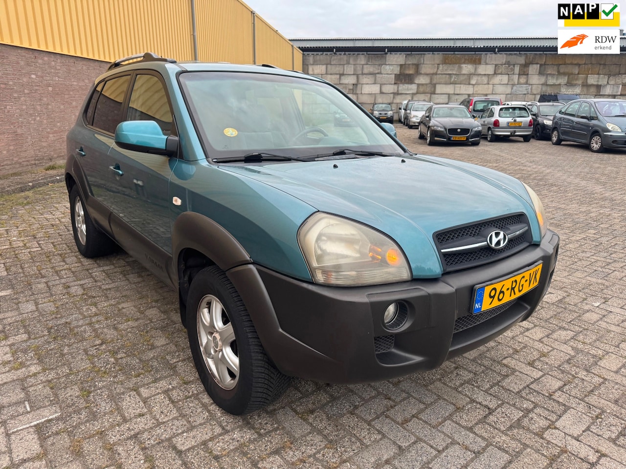 Hyundai Tucson - 2.0i Dynamic Airco, trekhaak, - AutoWereld.nl