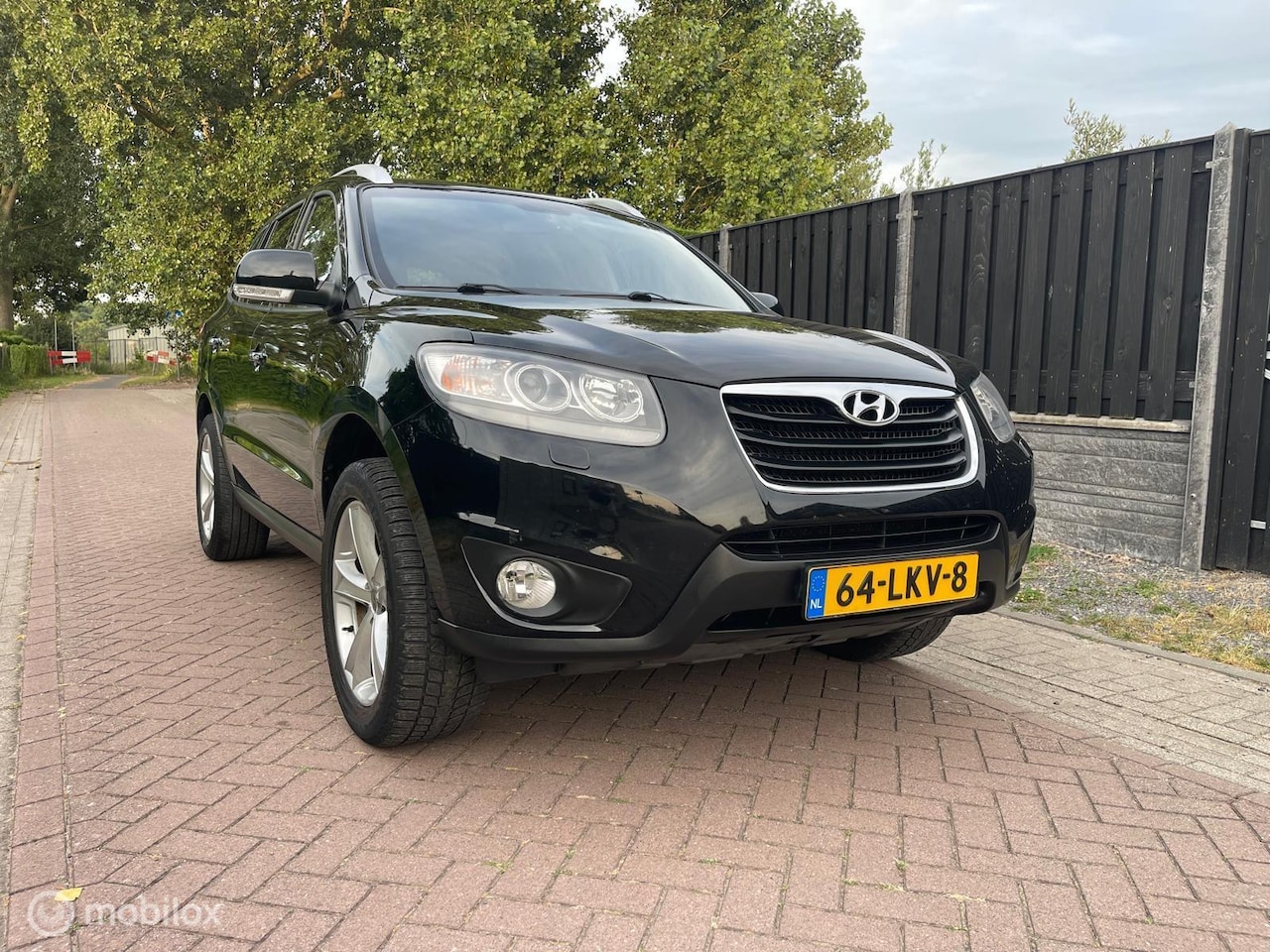 Hyundai Santa Fe - 2.4i CVVT 4WD Style 2.4i CVVT 4WD Style - AutoWereld.nl