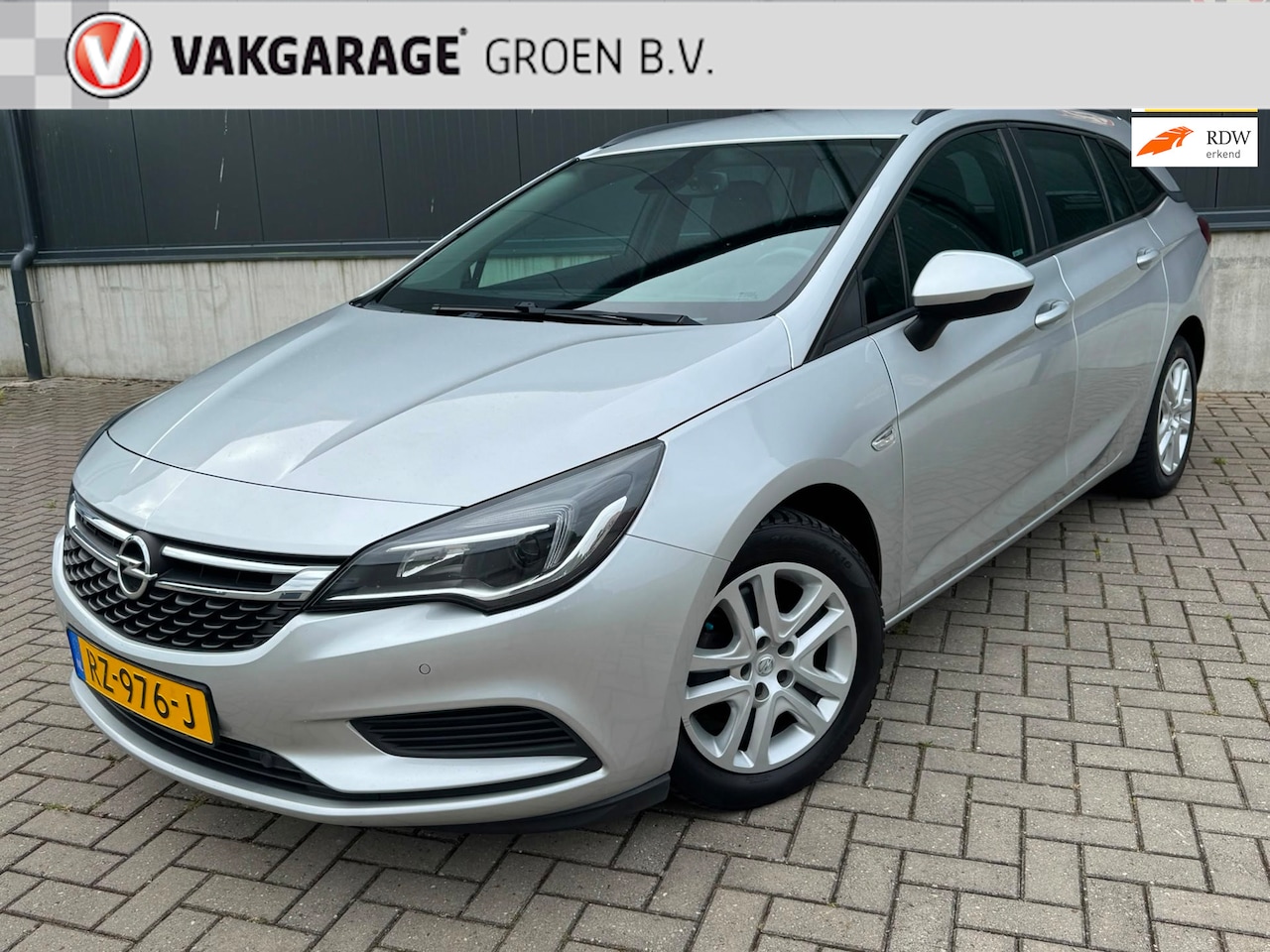 Opel Astra Sports Tourer - 1.0 Online Edition / cruise / camera / pdc v+a / trekhaak ! - AutoWereld.nl