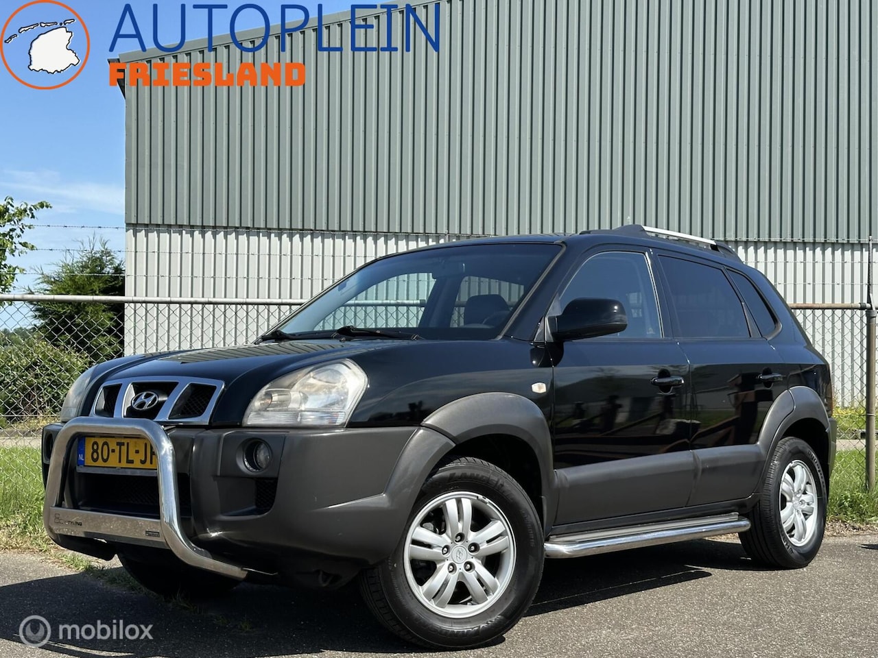 Hyundai Tucson - 2.0i Style|Trekhaak|Leer|Clima|PDC|Cruise - AutoWereld.nl