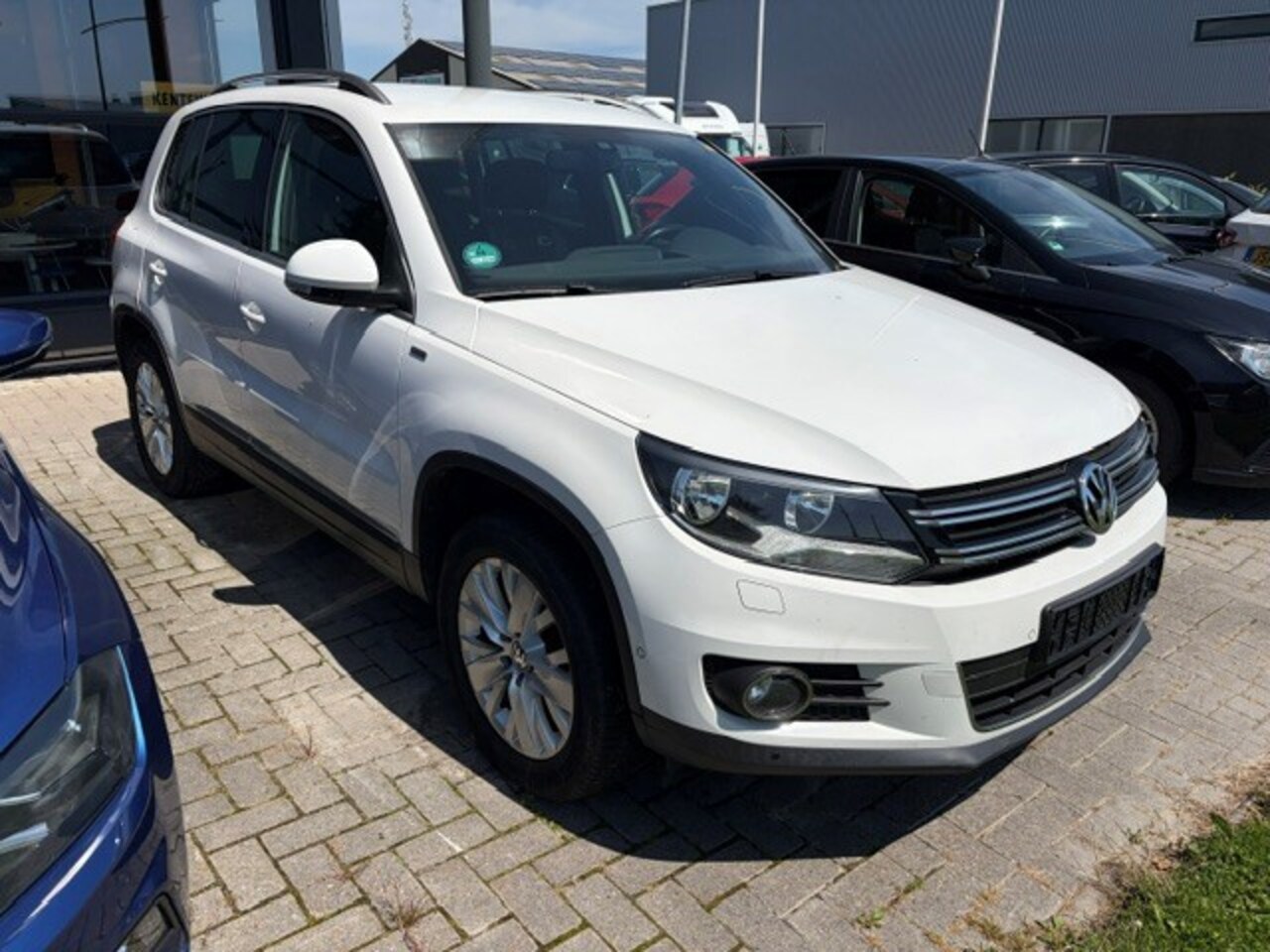 Volkswagen Tiguan - 1.4 TSI Sport&Style - AutoWereld.nl