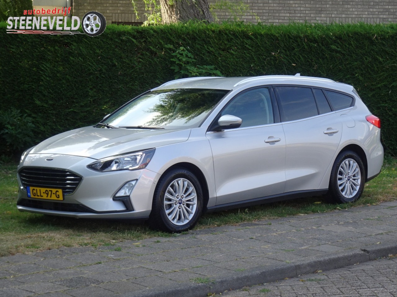 Ford Focus Wagon - 1.0 125pk Hybrid Titanium met Navi, Camera en WinterPack - AutoWereld.nl