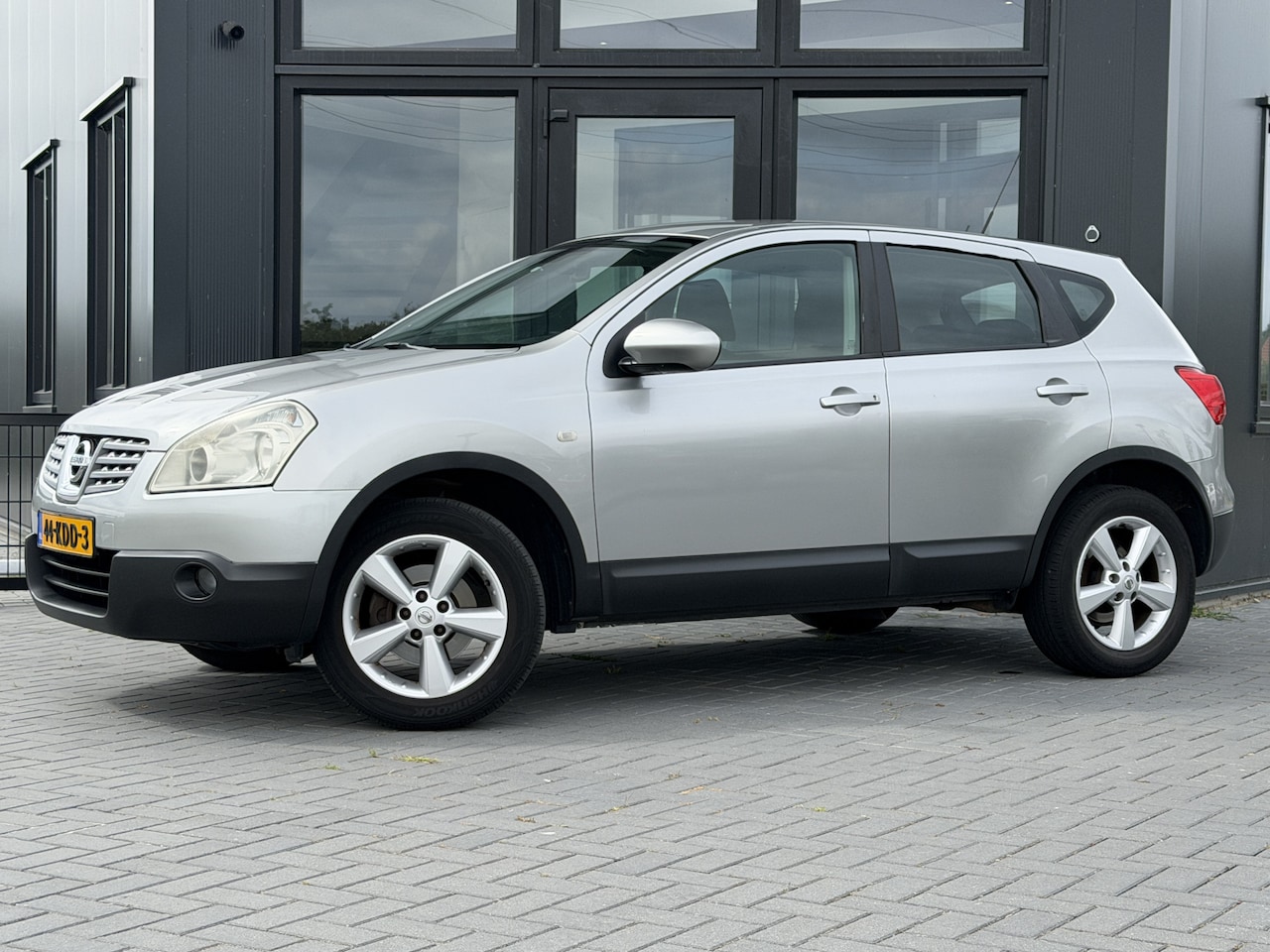 Nissan Qashqai - 1.6 Acenta Clima | Cruise | Navi | Parkeercamera - AutoWereld.nl