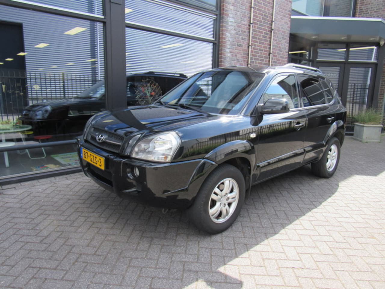 Hyundai Tucson - 2.0 I 2WD Executive - AutoWereld.nl