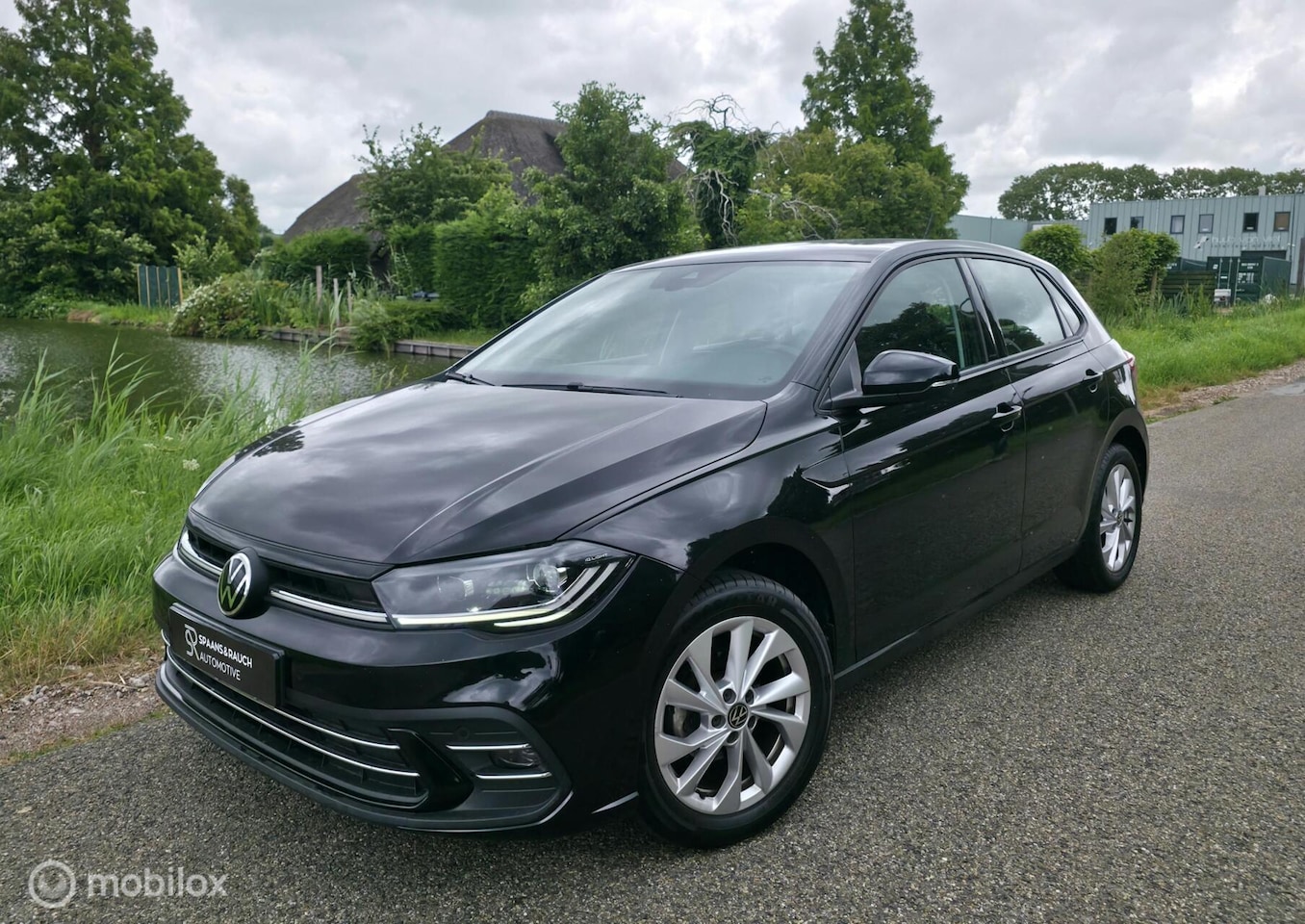 Volkswagen Polo - 1.0 TSI / Luxe / Navi / Camera / Carplay - AutoWereld.nl