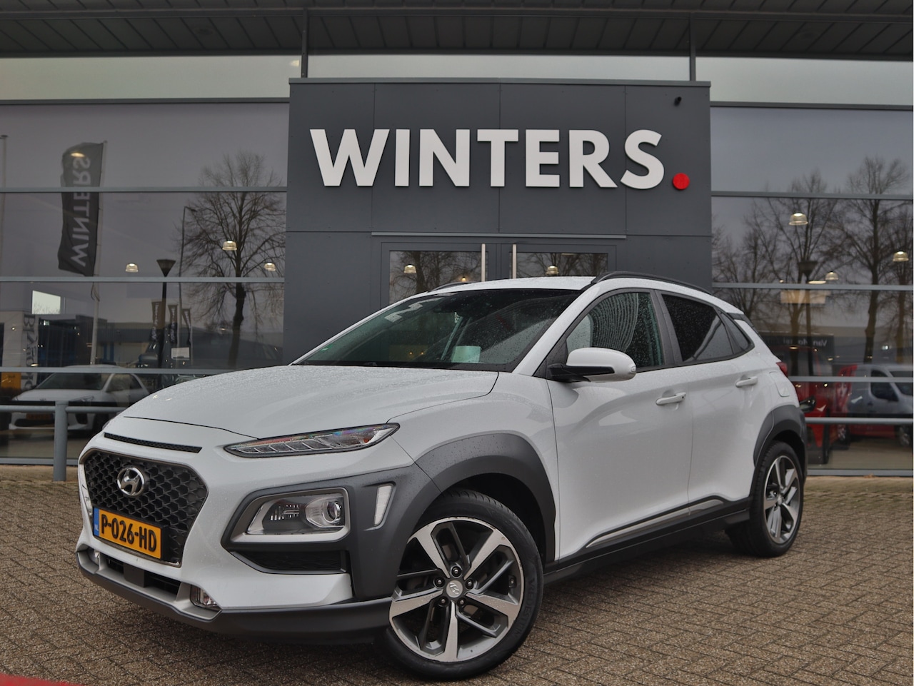 Hyundai Kona - 1.0 T-GDI Premium Leder | Stoelverwarming | Stuurverwarming | Navigatie | Trekhaak | Cruis - AutoWereld.nl
