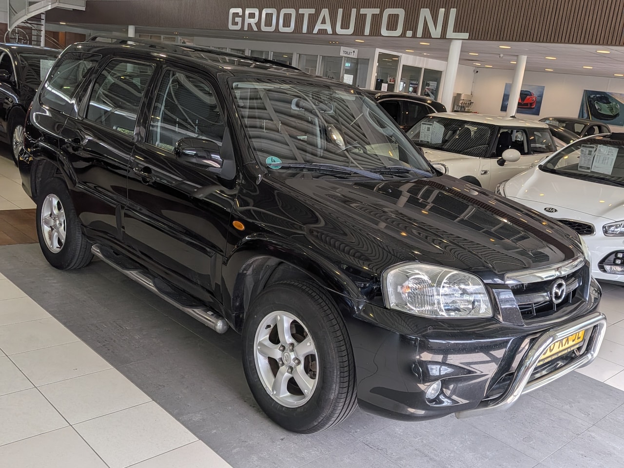 Mazda Tribute - 2.3i Touring 4WD, Airco, Cruise Control - AutoWereld.nl