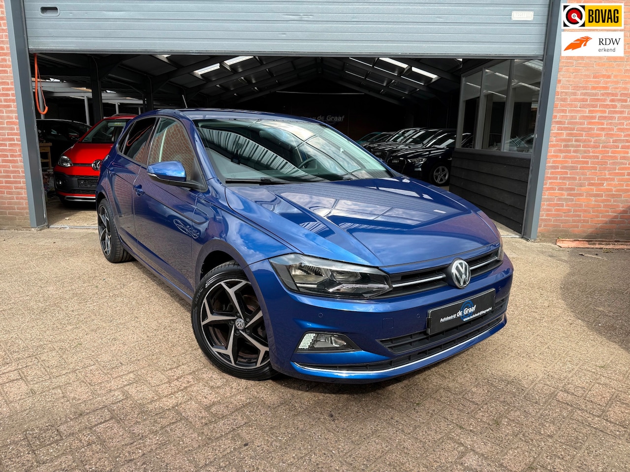 Volkswagen Polo - 1.0 TSI Highline|CRUISE/PDC/NAVI/SIDE-ASS/ - AutoWereld.nl