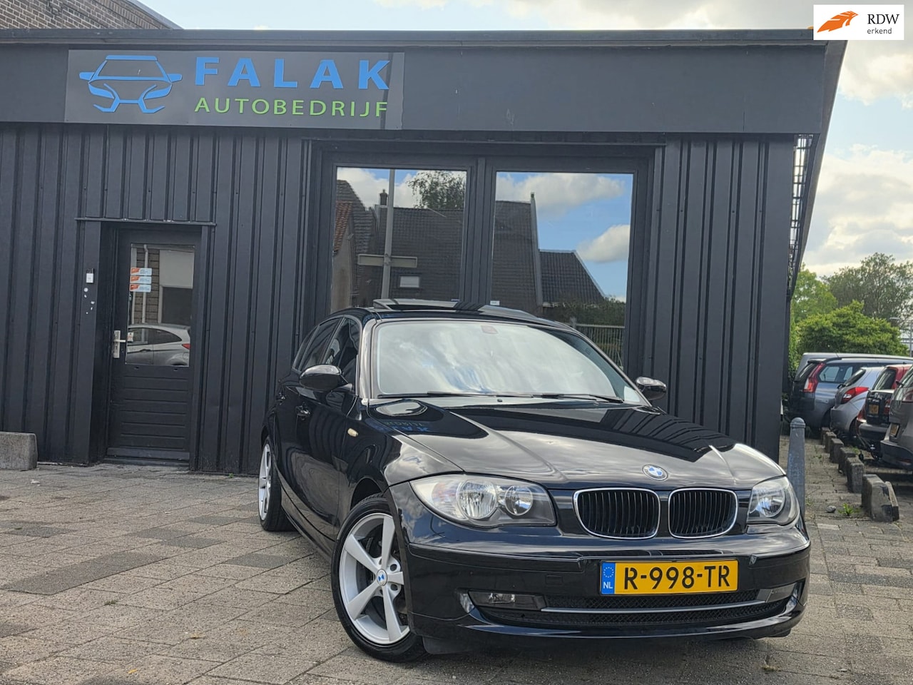 BMW 1-serie - 118i schuifdak/panoramadak - AutoWereld.nl
