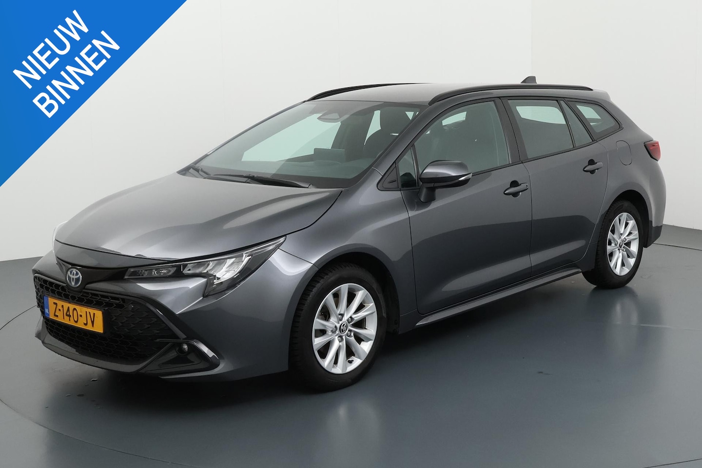 Toyota Corolla Touring Sports - HYBRID 140 ACTIVE I P-CAMERA I APPLE CARPLAY I ANDROID AUTO I NAVIGATIE I CLIMATE CONTROL - AutoWereld.nl