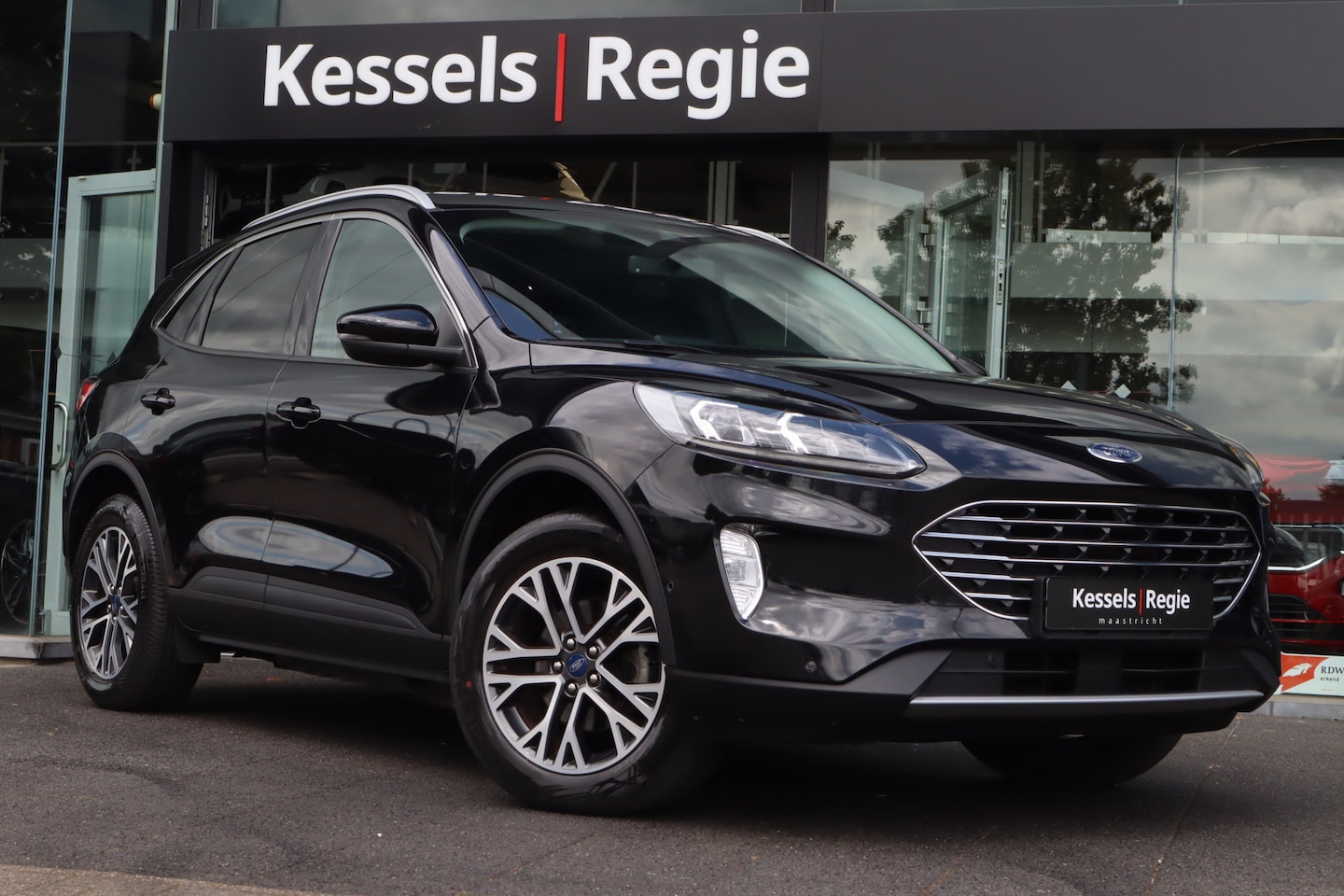 Ford Kuga - 2.5 PHEV Titanium X | HuD | B&O | ACC | El.Haak | Keyless | Camera | CarPlay | Stuur/Stoel - AutoWereld.nl