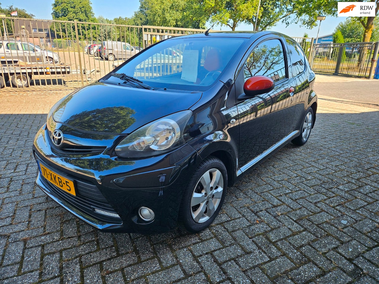 Toyota Aygo - 1.0 VVT-i Dynamic Orange 1.0 VVT-i Dynamic Orange - AutoWereld.nl