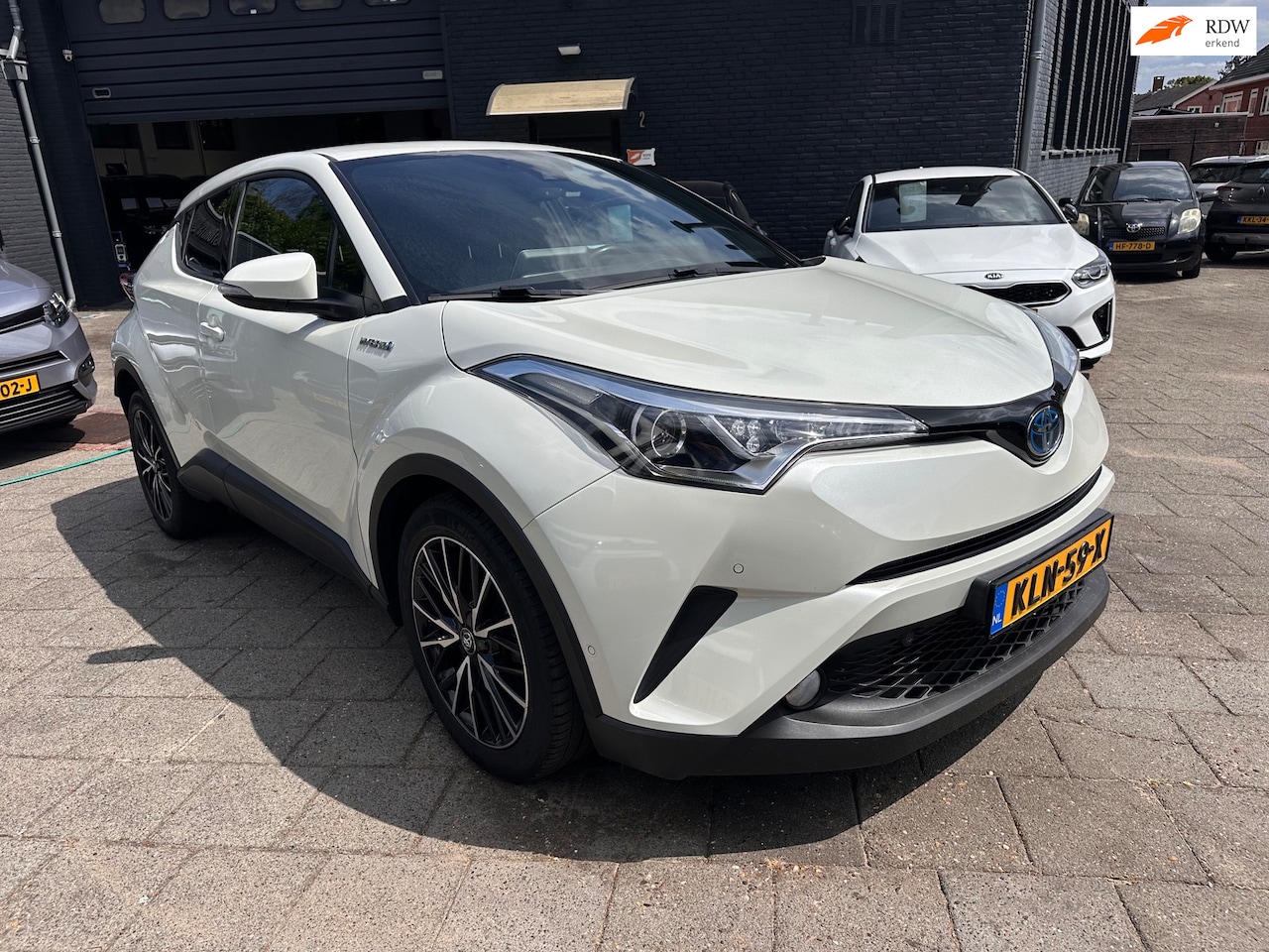 Toyota C-HR - 1.8 Hybrid Black Edition|Leder|Navi - AutoWereld.nl