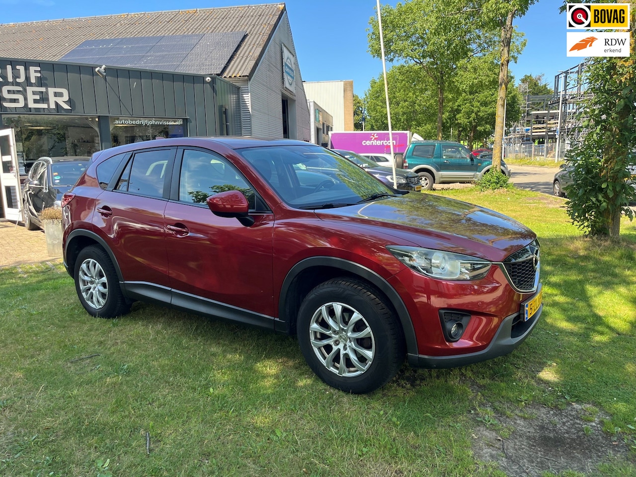 Mazda CX-5 - 2.0 TS+ 2WD * SUV * comfort & elegantie * airco * cruise * stralende metallic rode lak * - AutoWereld.nl