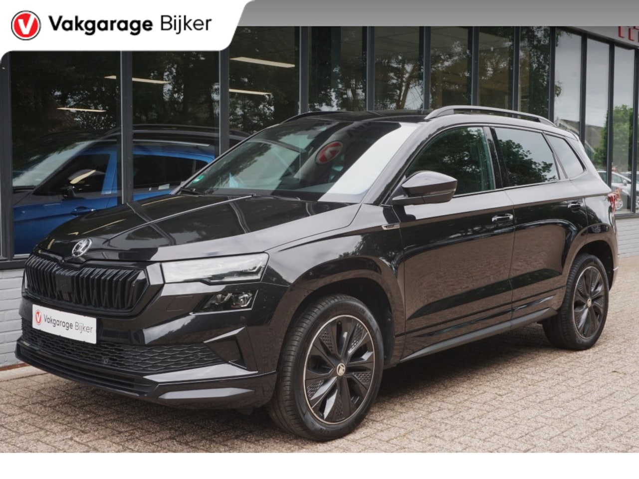 Skoda Karoq - 1.5 TSI ACT Sportline Business Camera/Navi/App-Connect! - AutoWereld.nl