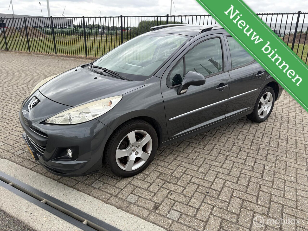 Peugeot 207 SW - 1.6 VTi Blue Lease Executive 1.6 VTi Blue Lease Executive - AutoWereld.nl