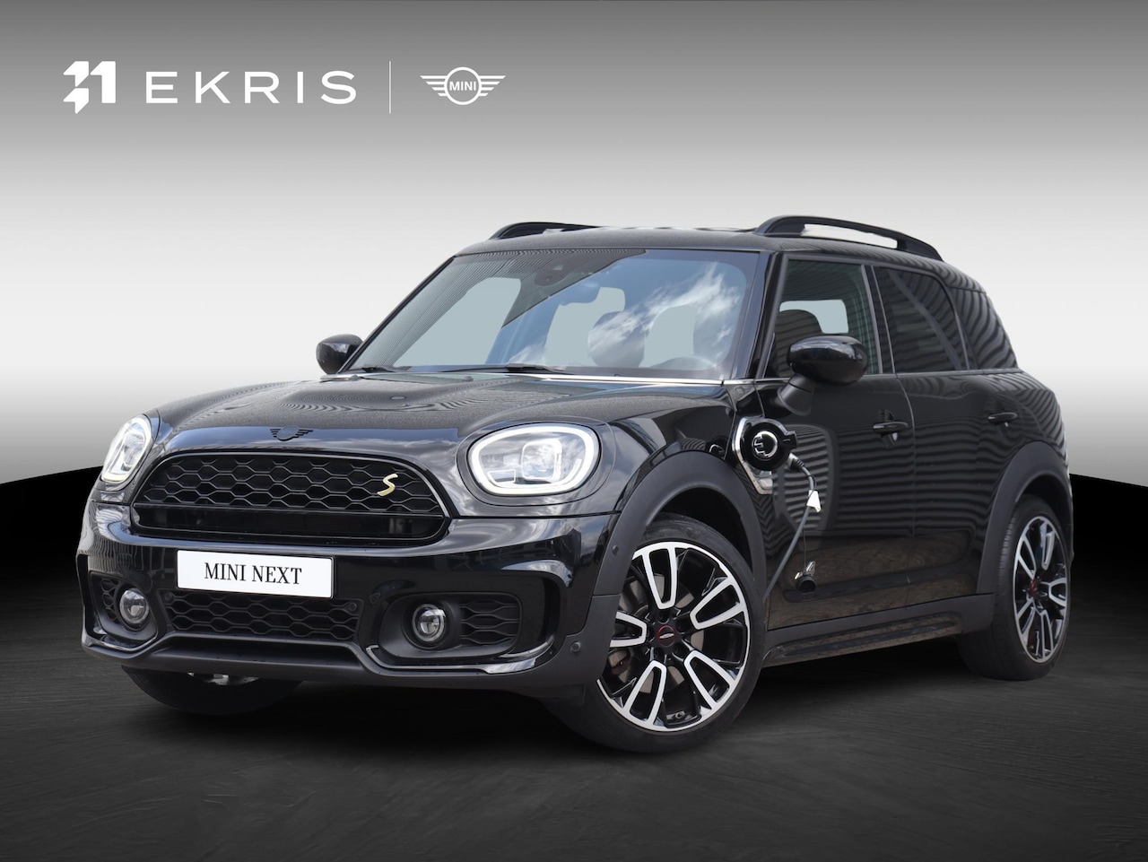 MINI Countryman - Cooper S E ALL4 | John Cooper Works + Panodak + Harman Kardon + Adaptive Cruise Control + - AutoWereld.nl