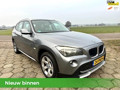 BMW X1 - sDrive18i 2011 | 2e Eigenaar | NAP | 6-Bak | Nieuwe APK| Navi scherm| Trekhaak| Airco