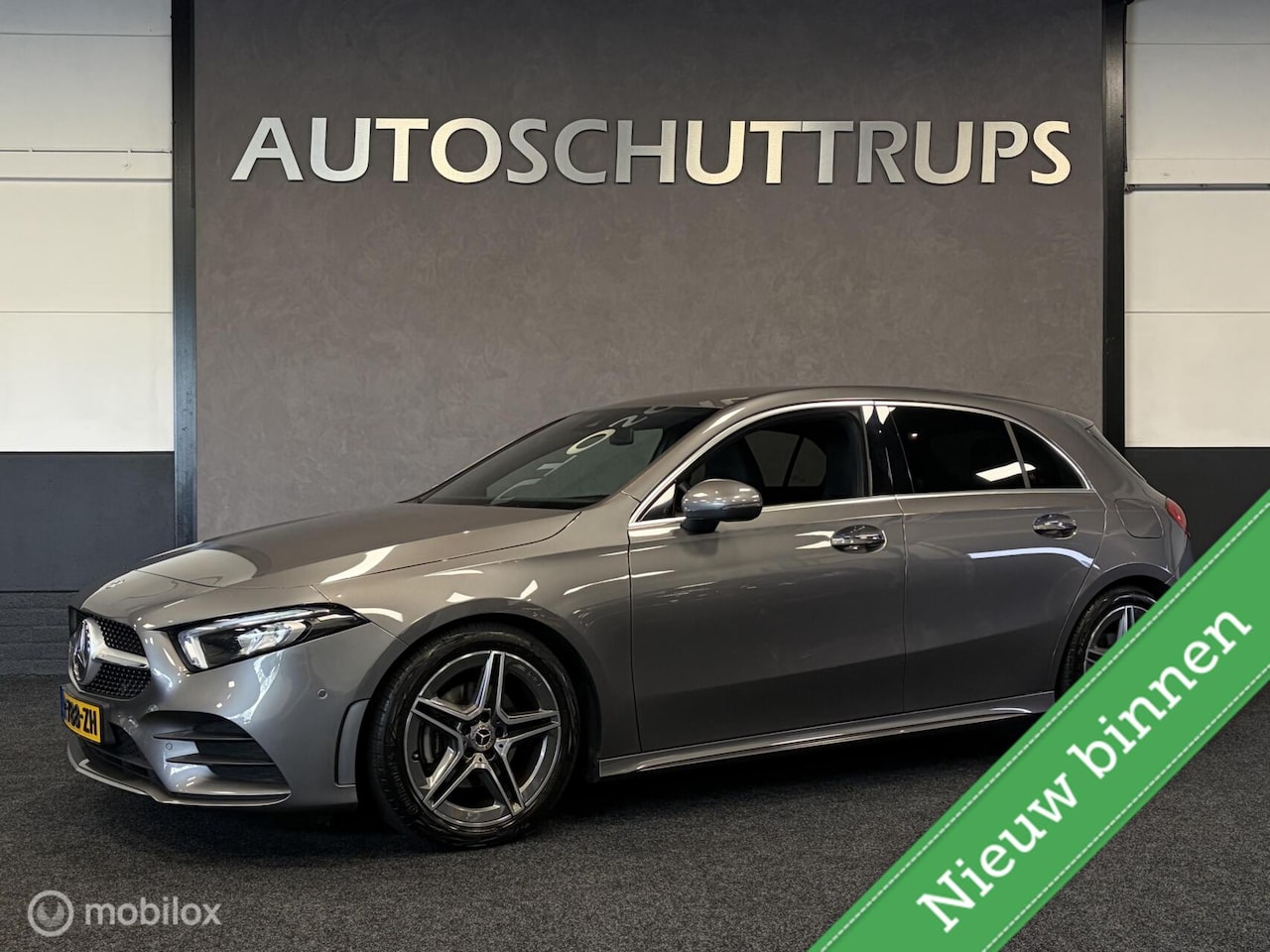 Mercedes-Benz A-klasse - 180 AMG Line LED / DIGI DASH / STOELVERW. / CARPLAY / PDC / CAMERA / NAP / - AutoWereld.nl