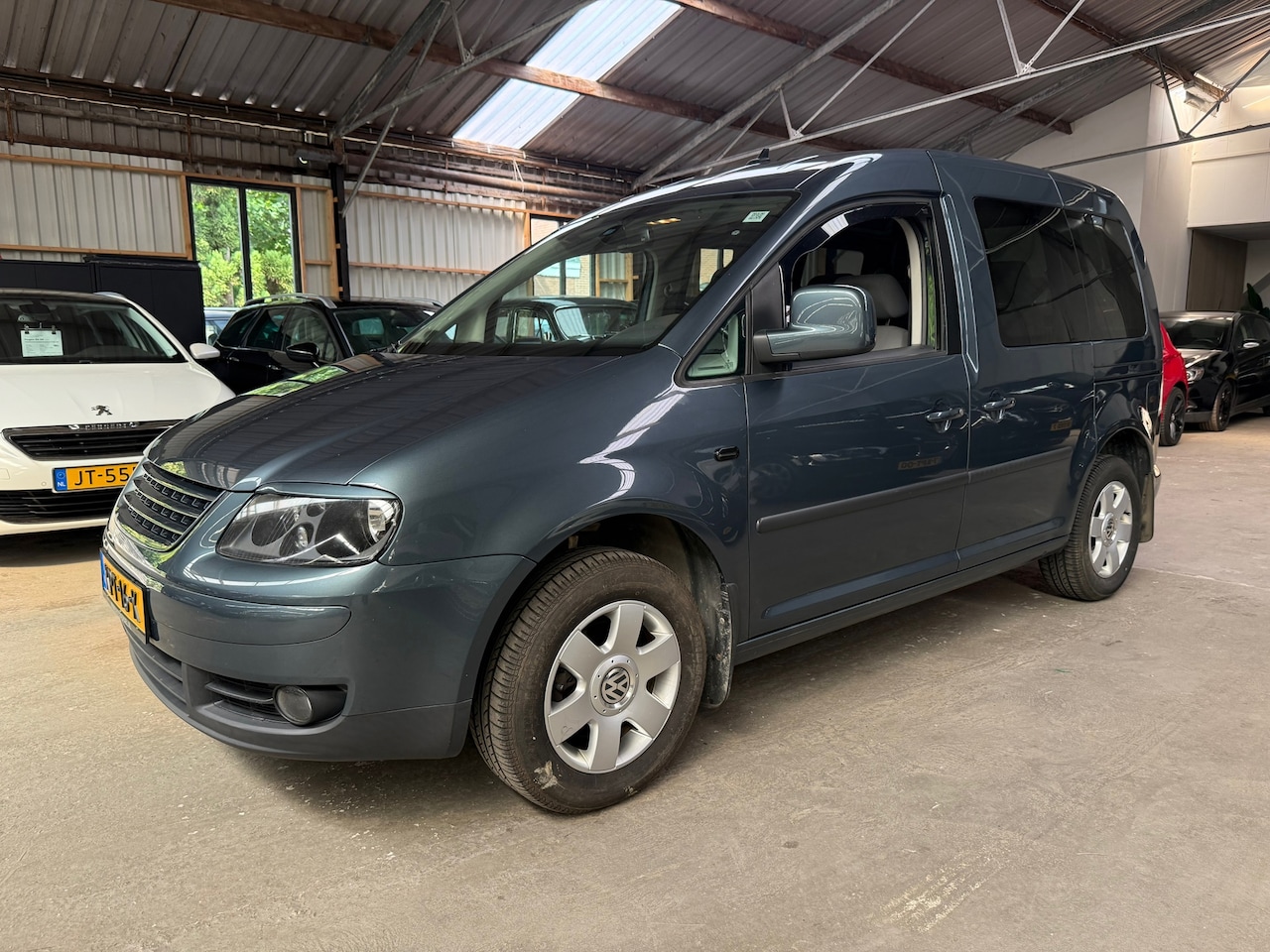 Volkswagen Caddy - 1.6 Comfortline 7p.Airco, Navigatie, LMV, dubbele schuifdeur - AutoWereld.nl