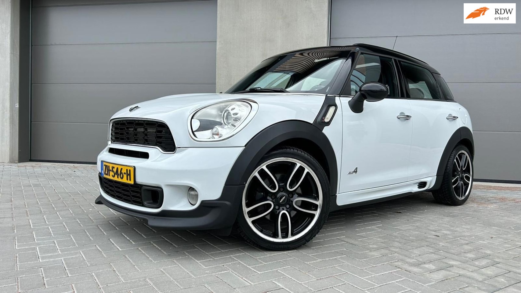 MINI Countryman - 1.6 Cooper S ALL4 Works, Leder, Pano, Harman Kardon - AutoWereld.nl