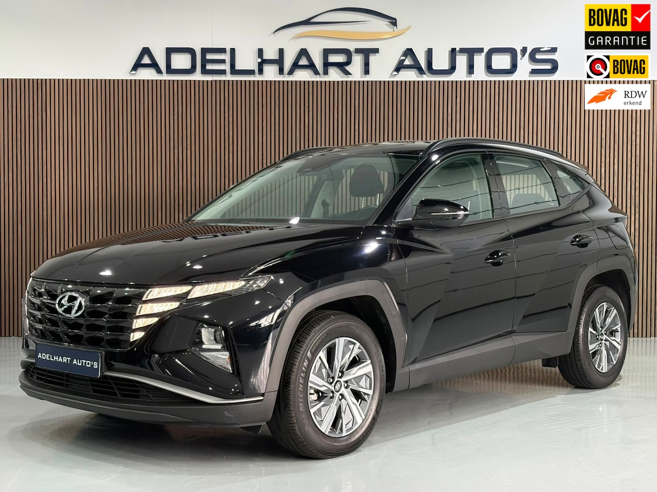 Hyundai Tucson - 1.6 T-GDI HEV Comfort 230 PK Automaat / Navigatie full map / Camera / Cruise control / Cli - AutoWereld.nl