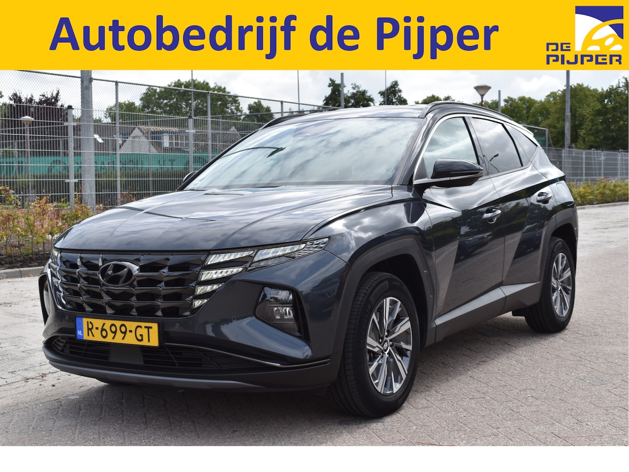 Hyundai Tucson - 1.6 T-GDI HEV Comfort Smart | NL- Auto | Nav. | stoel-stuurverw. | Afn. Trekhaak - AutoWereld.nl