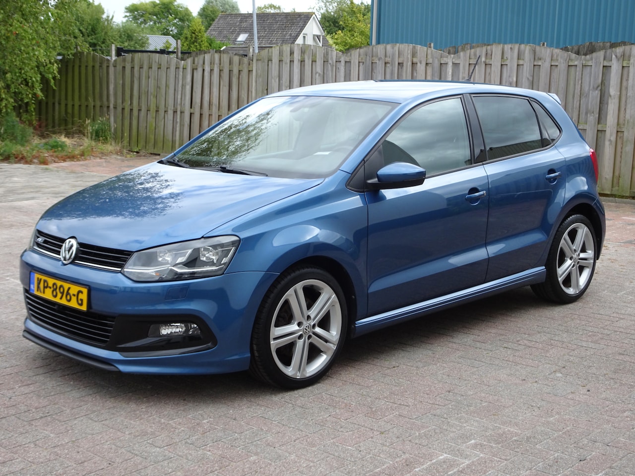Volkswagen Polo - 1.0 TSI Highline Automatische airco, licht metalen velgen, trekhaak, navigatie, camera voo - AutoWereld.nl