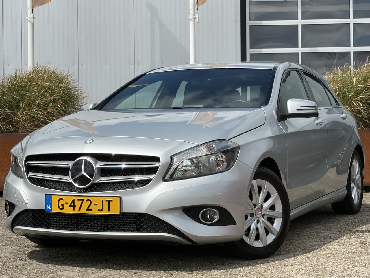 Mercedes-Benz A-klasse - 180 Ambition 122pk | Airco | Bluetooth | Cruise control | Isofix bevestiging voor kinderzi - AutoWereld.nl