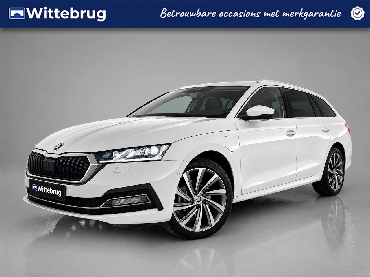Skoda Octavia Combi - 1.4 TSI 204pk DSG iV PHEV Business Edition Plus / Panorama dak / Achteruitrij camera / Sto - AutoWereld.nl