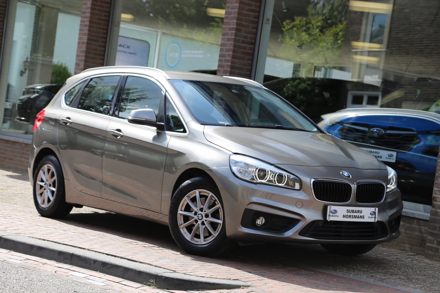 BMW 2-serie Active Tourer - 218i Essential Automaat Navi LED PDC Trekhaak - AutoWereld.nl