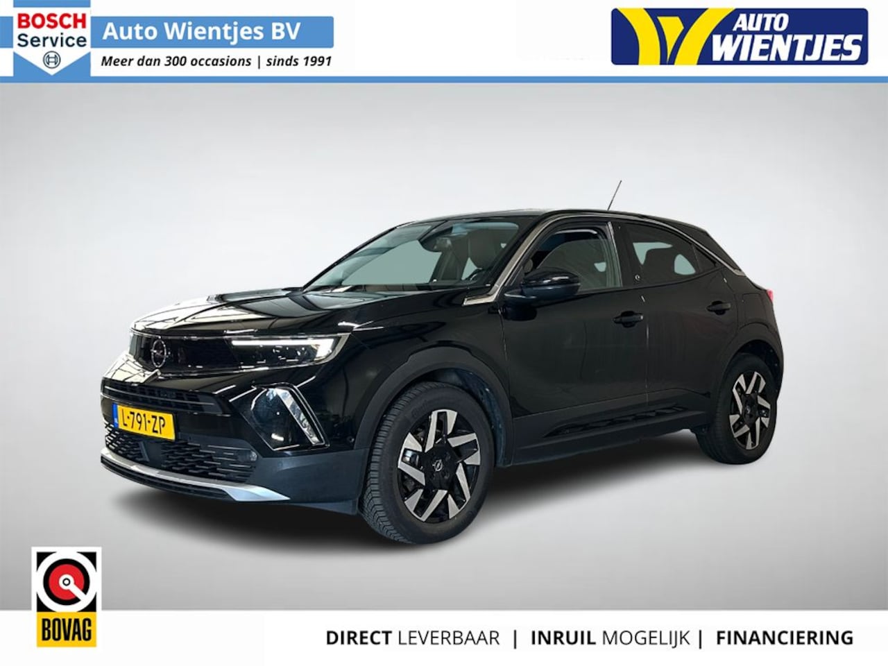 Opel Mokka-e - Business Elegance 50kWh 3-Fase | SOH 90% | Leer | Navi | Camera - AutoWereld.nl