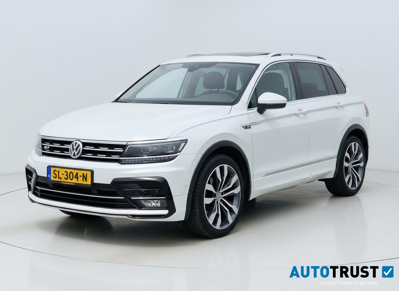 Volkswagen Tiguan - 1.4 TSI ACT Highline ADAP CRUISE PANO - AutoWereld.nl