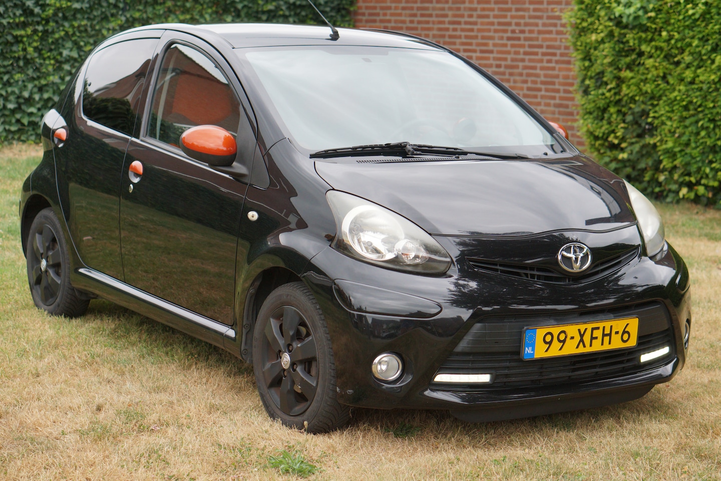 Toyota Aygo - 1.0 VVT-i Dynamic Orange - AutoWereld.nl