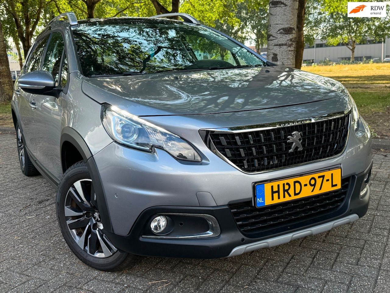 Peugeot 2008 - 1.2 PureTech Allure glas dak camera - AutoWereld.nl