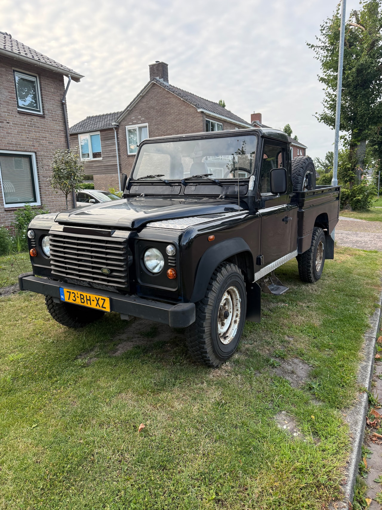 Land Rover Defender - 2.5 Td5 110" E Defender 110, pick-up, airco - AutoWereld.nl