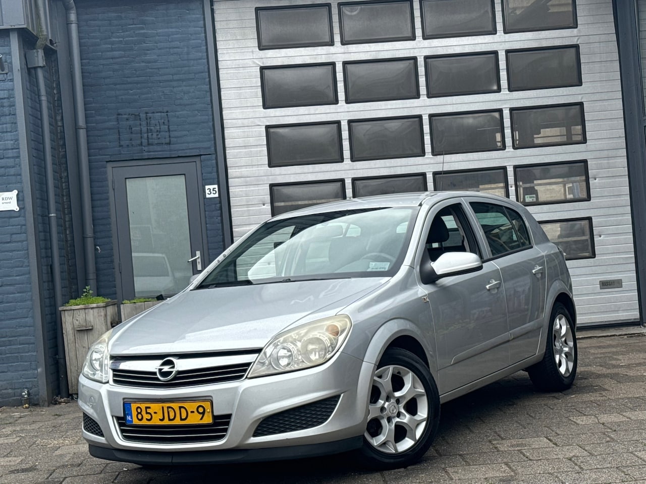 Opel Astra - 1.6 Executive | Airco | Cruise | PDC | LMV - AutoWereld.nl