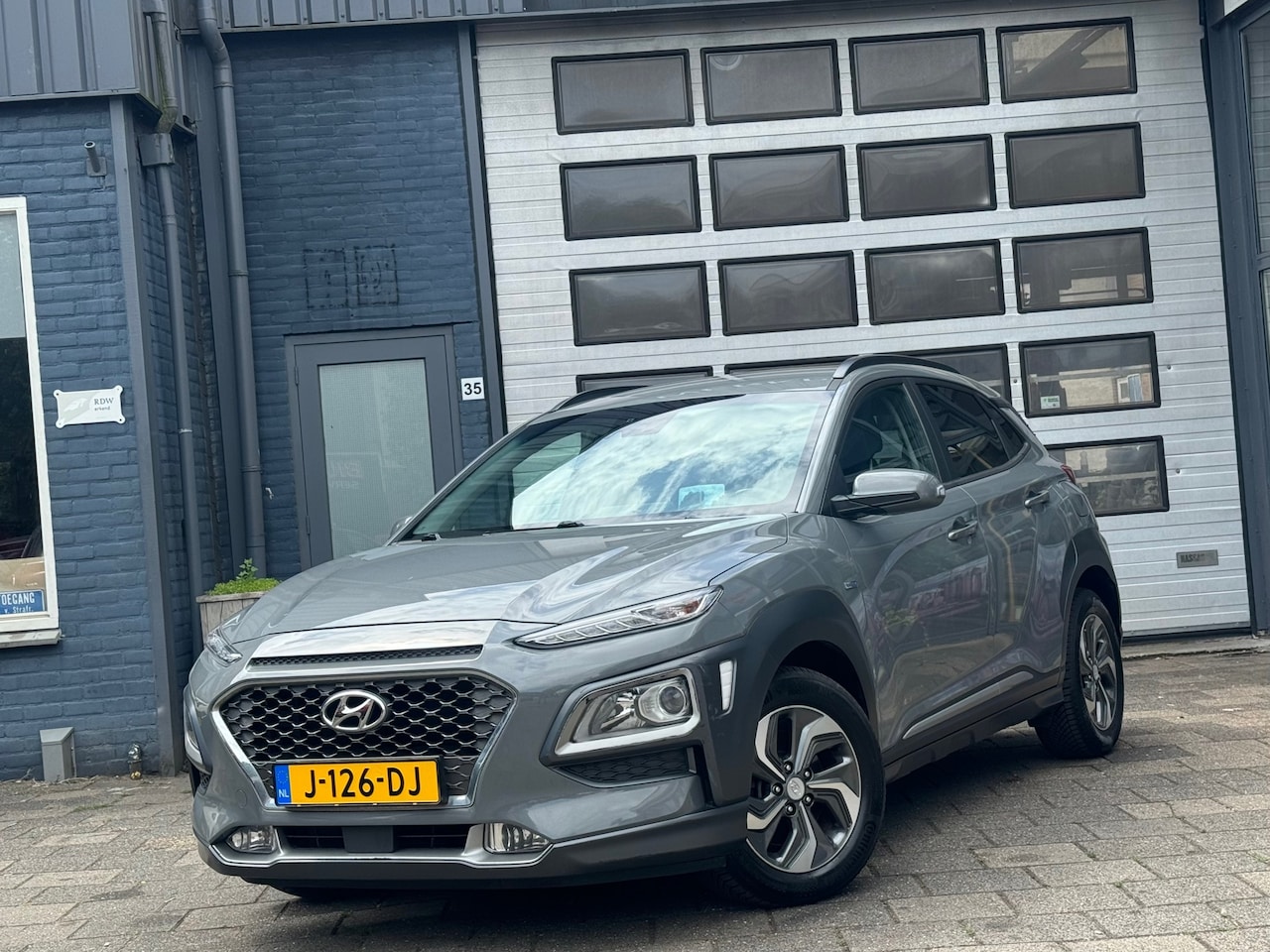 Hyundai Kona - 1.6 GDI HEV Fashion | Clima | Navi | Camera | N.A.P - AutoWereld.nl