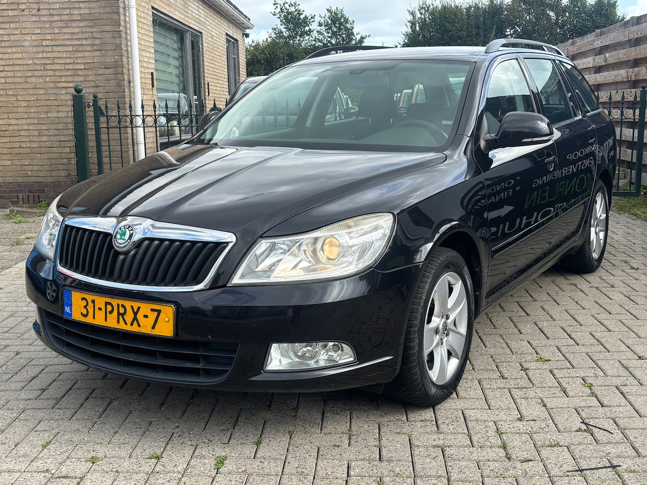 Skoda Octavia Combi - 1.2 TSI Ambition Business Line | airco | navi | cruise | trekhaak | lange apk ! - AutoWereld.nl