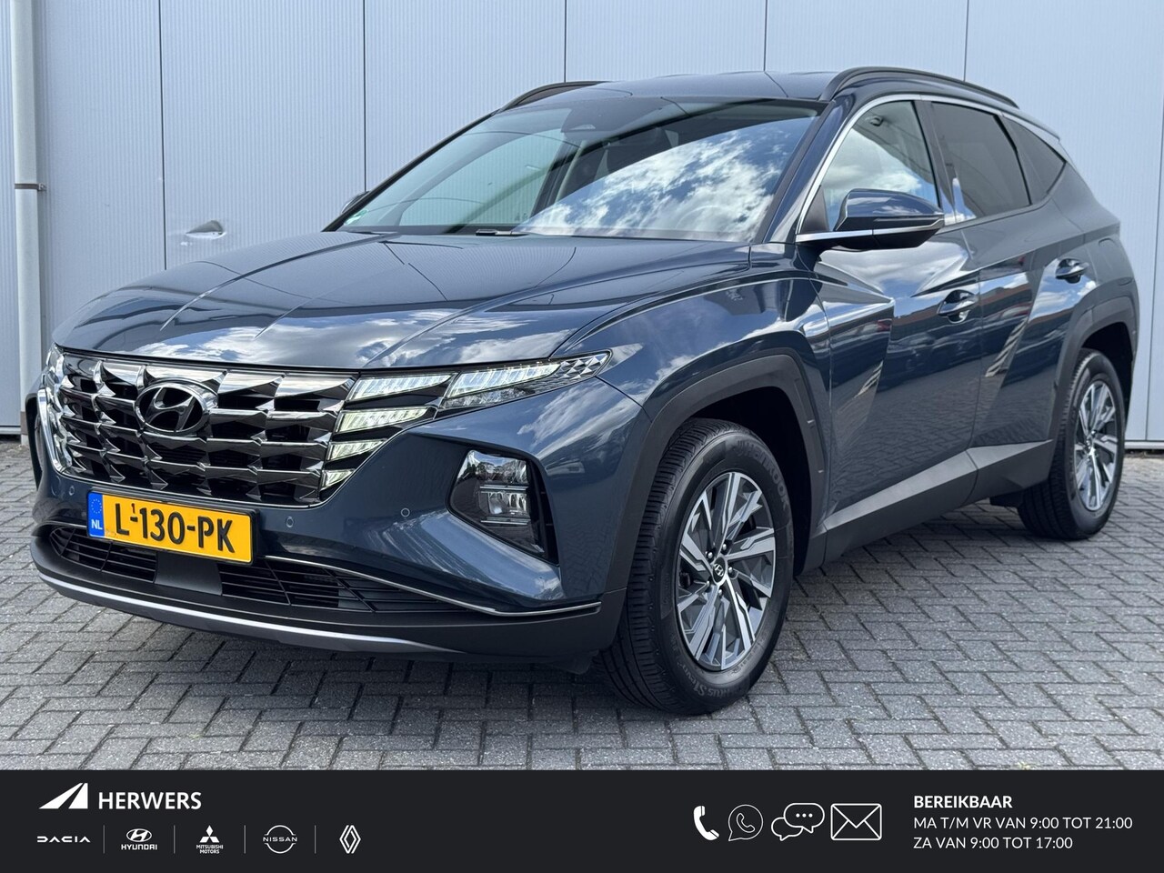 Hyundai Tucson - 1.6 T-GDI HEV Comfort / Navigatie / Trekhaak met 1650 kg / Dealeronderhouden / Stoelverwar - AutoWereld.nl