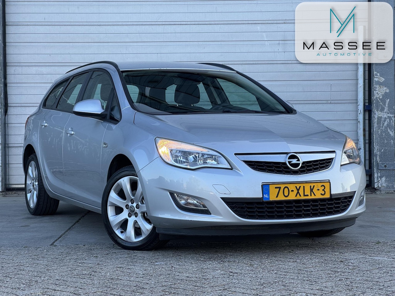 Opel Astra Sports Tourer - 1.4 Cosmo NL AUTO | 2e EIG | AIRCO - AutoWereld.nl